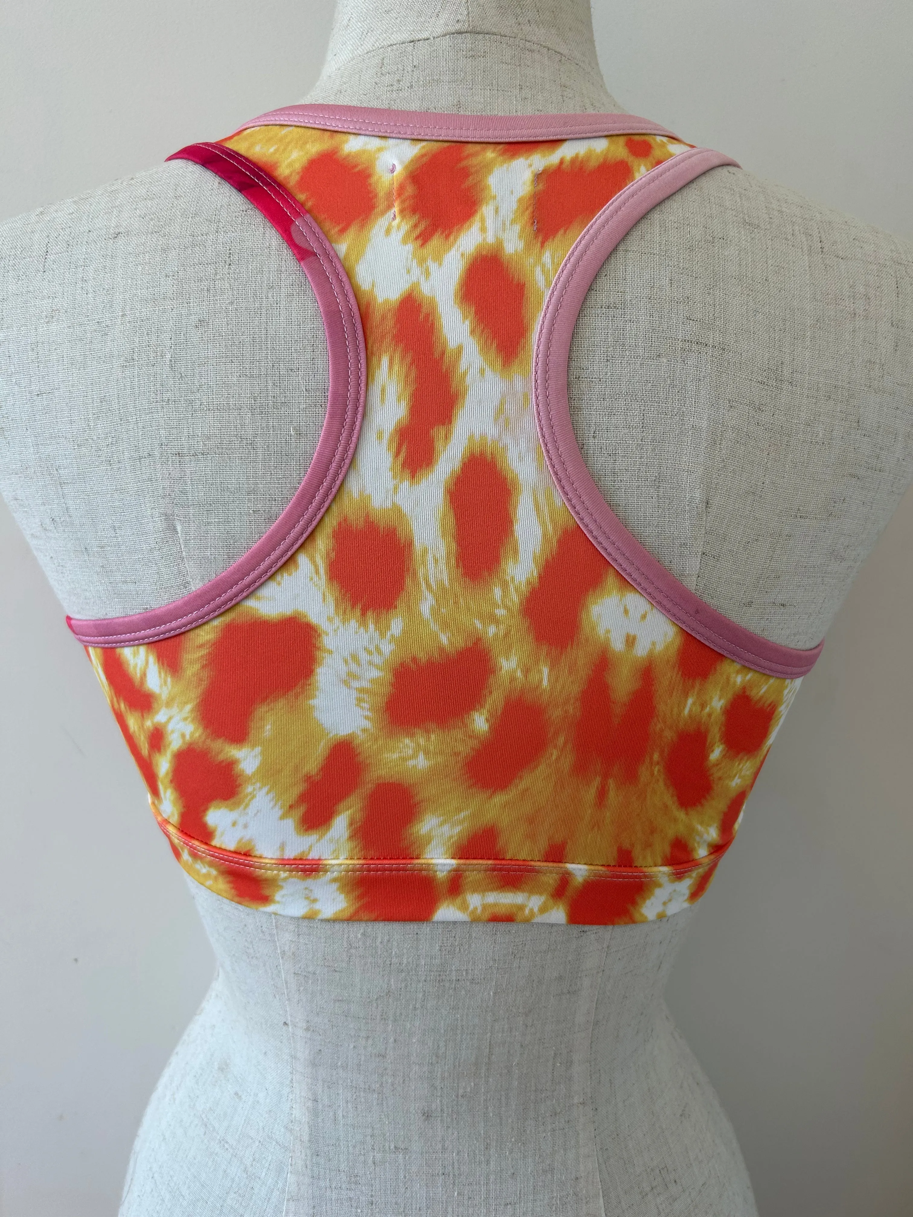 Cropped racer back top cheetah bouquet