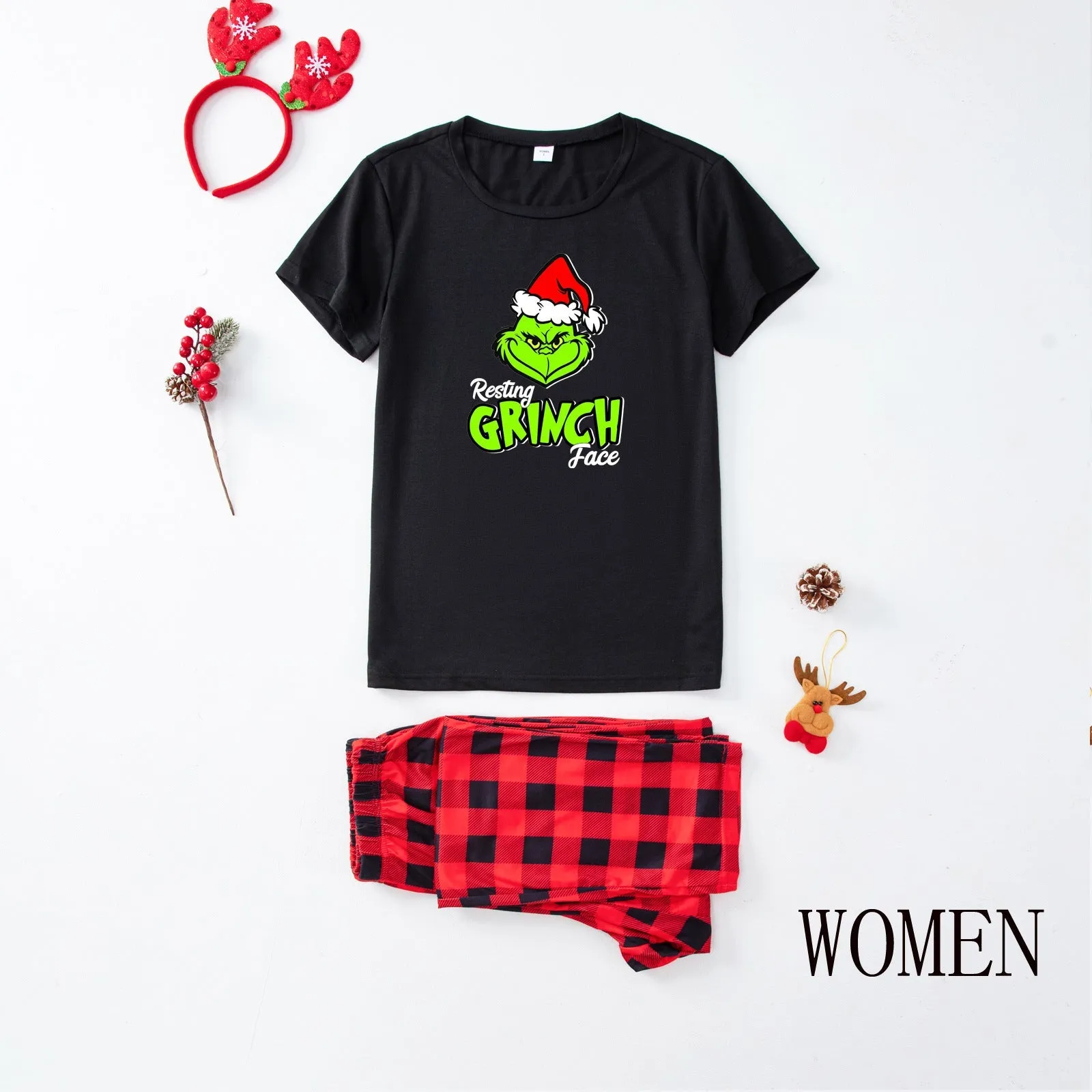 Family matching pajamas with Santa & Grinch print