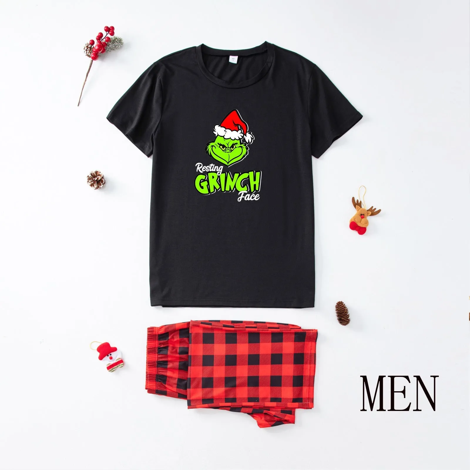 Family matching pajamas with Santa & Grinch print